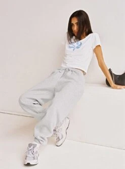 Take Care Charity Baby Tee White -Chic Clothing Shop 3 modelinfo camelia us2 1505142e 1227 4713 8384 0b27f4dfa7b4