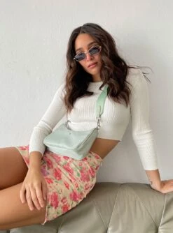 Princess Polly Jax Long Sleeve Top White 11 Princess Polly Jax Long Sleeve Top White -Chic Clothing Shop JAX LONG SLEEVE TOP WHITE WINSLOW MINI SKIRT CREAM